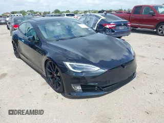 2017 Tesla Model S 100D z VIN 5YJSA1E45HF198921, wystawiony jako IAAI lot #42378026 z przebiegiem 104 967 mil mil oraz . Historia ofert i sprzedaży dostępna na DreamBid. Obrazek 1.