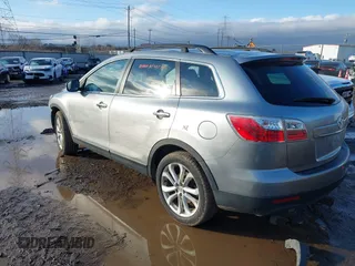 2011 Mazda CX-9 Grand Touring with VIN JM3TB3DV1B0302986, listed as a IAAI auction lot 41500223 with 156,244 mi miles. Bid and sale history available at carsss.com. Image 3.
