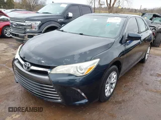 2015 Toyota Camry XLE with VIN 4T4BF1FK9FR450447, listed as a IAAI auction lot 41771512 with 218,691 mi miles and . Bid and sale history available at DreamBid. Image 2.