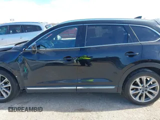 2017 Mazda CX-9 Grand Touring with VIN JM3TCBDYXH0131388, listed as a IAAI auction lot 41252943 with 61,027 mi miles. Bid and sale history available at carsss.com. Image 14.