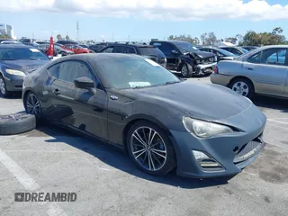 2016 Scion FR-S z VIN JF1ZNAA15G9701523, wystawiony jako IAAI lot #42258205 z przebiegiem 83 688 mil mil oraz . Historia ofert i sprzedaży dostępna na DreamBid. Obrazek 1.
