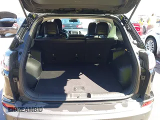 2019 Jeep Cherokee Latitude Plus with VIN 1C4PJMLB1KD465933, listed as a IAAI auction lot 42624557 with 68,045 mi miles and . Bid and sale history available at DreamBid. Image 18.