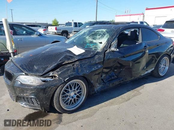 2014 BMW 2 Series M235i with VIN WBA1J7C50EVX33903, listed as a IAAI auction lot 40207684 with 81,766 mi miles and . Bid and sale history available at DreamBid. Image 16.