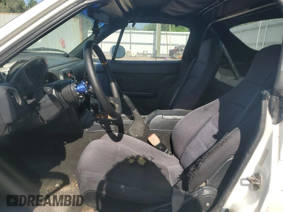 1991 Mazda MX-5 Miata Special Edition z VIN JM1NA3515M0231262, wystawiony jako Copart lot #57221675 z przebiegiem 241 670 mil mil oraz Szkoda całkowita • Salvage title. Historia ofert i sprzedaży dostępna na DreamBid. Obrazek 7.