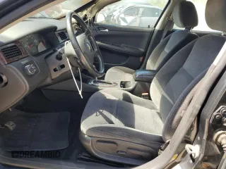 2013 Chevrolet Impala LT with VIN 2G1WB5E36D1174386, listed as a Copart auction lot 52981755 with 76,455 mi miles and Salvage Title. Bid and sale history available at DreamBid. Image 7.