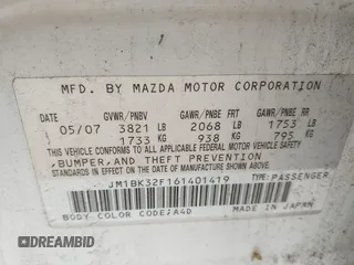 2006 Mazda 3 i Touring with VIN JM1BK32F161401419, listed as a IAAI auction lot 42261618 with 96,772 mi miles and . Bid and sale history available at DreamBid. Image 9.