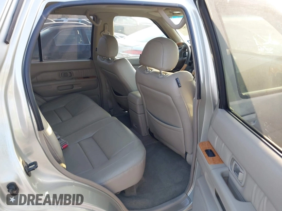 2001 Infiniti QX4 Luxury z VIN JNRDR07XX1W101118, wystawiony jako IAAI lot #41798112 z przebiegiem 184 082 mil mil oraz . Historia ofert i sprzedaży dostępna na DreamBid. Obrazek 8.