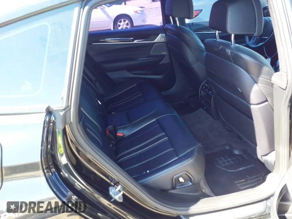 2018 BMW 6 Series 640i xDrive with VIN WBAJV6C5XJBK07708, listed as a IAAI auction lot 41784298 with 70,000 mi miles and . Bid and sale history available at carsss.com. Image 8.