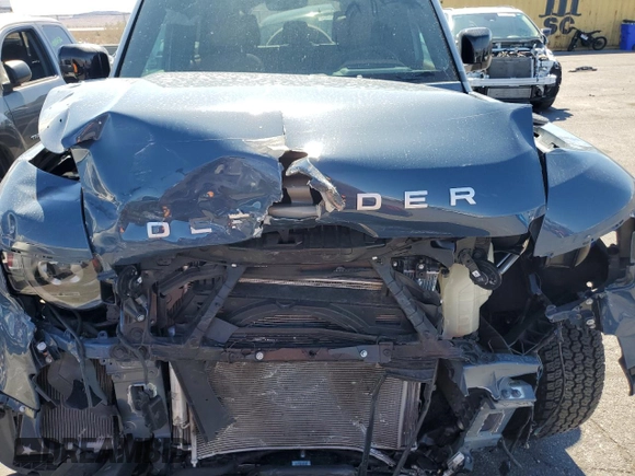 2023 Land Rover Defender SE with VIN SALEP7EU1P2207252, listed as a Copart auction lot 49336395 with 20,179 mi miles and Salvage title. Bid and sale history available at DreamBid. Image 12.