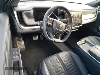 2022 Rivian R1S Launch Edition with VIN 7PDSGABL5NN001035, listed as a Copart auction lot 77188564 with Not Provided miles and Salvage Title. Bid and sale history available at carsss.com. Image 8.