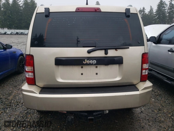 2011 Jeep Liberty Sport Jet with VIN 1J4PP2GK7BW540727, listed as a Copart auction lot 87417434 with 192,473 mi miles and Salvage title. Bid and sale history available at DreamBid. Image 6.