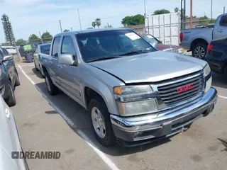 2010 GMC Canyon SLE1 with VIN 1GTDSCDEXA8138621, listed as a IAAI auction lot 42042749 with 169,354 mi miles. Bid and sale history available at carsss.com. Image 1.