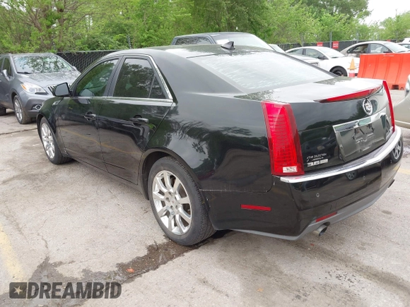 2009 Cadillac CTS AWD w/1SB with VIN 1G6DT57V290165006, listed as a IAAI auction lot 42144947 with 162,969 mi miles. Bid and sale history available at carsss.com. Image 3.