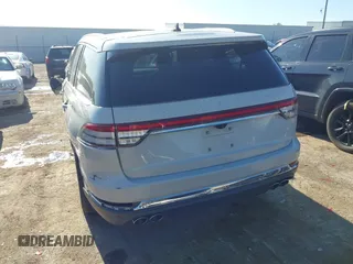 2021 Lincoln Aviator Reserve z VIN 5LM5J7WC6MGL12195, wystawiony jako IAAI lot #42159567 z przebiegiem 95 199 mil mil oraz . Historia ofert i sprzedaży dostępna na DreamBid. Obrazek 16.