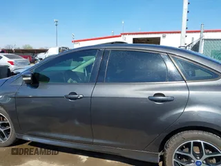 2015 Ford Focus SE with VIN 1FADP3F29FL268677, listed as a IAAI auction lot 42037244 with 118,018 mi miles. Bid and sale history available at carsss.com. Image 15.