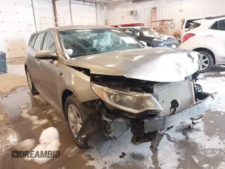 2017 Kia Optima LX with VIN 5XXGT4L33HG148897, listed as a IAAI auction lot 41565592 with 61,471 mi miles and . Bid and sale history available at carsss.com. Image 18.