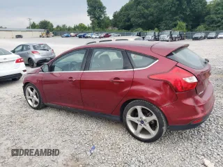 2014 Ford Focus Titanium with VIN 1FADP3N29EL422689, listed as a Copart auction lot 59817535 with 105,515 mi miles and Salvage title. Bid and sale history available at DreamBid. Image 2.