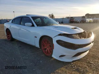 2019 Dodge Charger Scat Pack with VIN 2C3CDXGJXKH520282, listed as a Copart auction lot 87208244 with Not Provided miles and Salvage Title. Bid and sale history available at DreamBid. Image 4.