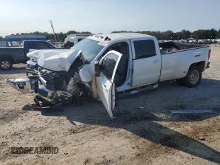 2018 Chevrolet Silverado 3500HD Work Truck with VIN 1GC4KZCG8JF218517, listed as a Copart auction lot 74915614 with 148,040 mi miles and Salvage Title. Bid and sale history available at carsss.com. Image 1.