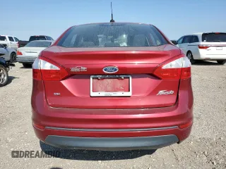 2017 Ford Fiesta SE z VIN 3FADP4BJ2HM112758, wystawiony jako Copart lot #46955455 z przebiegiem 115 377 mil mil oraz Czysty tytuł • Clean title. Historia ofert i sprzedaży dostępna na DreamBid. Obrazek 6.