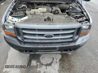 2000 Ford F-250 XL with VIN 1FTNX21F3YED35736, listed as a Copart auction lot 50309805 with 303,811 mi miles and Salvage title. Bid and sale history available at DreamBid. Image 11.