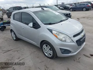 2015 Chevrolet Spark LS with VIN KL8CB6S95FC736907, listed as a IAAI auction lot 41487975 with 102,915 mi miles and . Bid and sale history available at DreamBid. Image 1.
