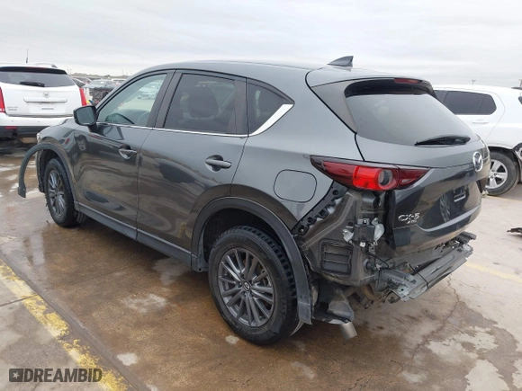 2021 Mazda CX-5 Touring with VIN JM3KFBCM0M0342210, listed as a IAAI auction lot 41236013 with 96,012 mi miles. Bid and sale history available at carsss.com. Image 3.