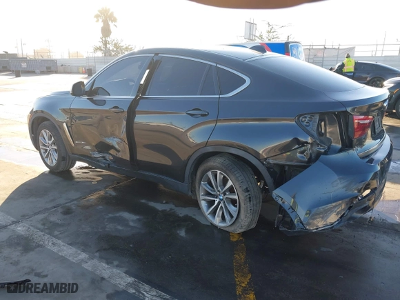 2019 BMW X6 sDrive35i with VIN 5UXKU0C57K0S97581, listed as a IAAI auction lot 41322568 with 76,635 mi miles. Bid and sale history available at carsss.com. Image 3.