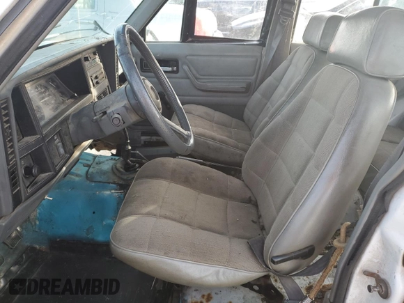 1994 Jeep Cherokee Sport with VIN 1J4FT68S0RL142185, listed as a Copart auction lot 80419344 with 172,294 mi miles and Salvage Title. Bid and sale history available at carsss.com. Image 7.