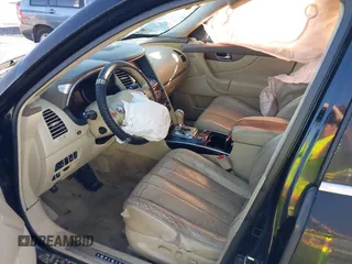 2014 Infiniti QX70 with VIN JN8CS1MU2EM451932, listed as a IAAI auction lot 41439834 with 125,781 mi miles and . Bid and sale history available at DreamBid. Image 5.