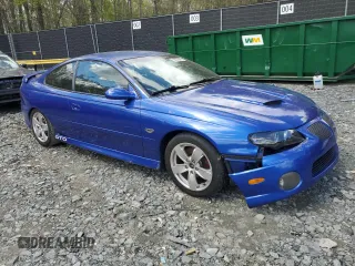 2005 Pontiac GTO z VIN 6G2VX12U55L432796, wystawiony jako Copart lot #53055995 z przebiegiem 147 253 mil mil oraz Szkody całkowita. Historia ofert i sprzedaży dostępna na DreamBid. Obrazek 4.