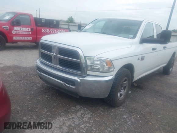 2012 Ram 2500 ST z VIN 3C6TD4HL7CG265349, wystawiony jako IAAI lot #42479271 z przebiegiem 301 419 mil mil oraz . Historia ofert i sprzedaży dostępna na DreamBid. Obrazek 2.