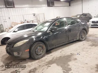 2009 Mazda 6 i Sport with VIN 1YVHP81A595M37636, listed as a IAAI auction lot 41536324 with 246,833 mi miles and . Bid and sale history available at carsss.com. Image 2.