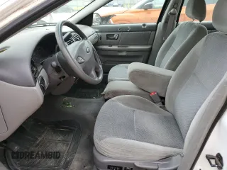 2002 Ford Taurus SE Standard с VIN 1FAFP53U02A133605, выставлен на аукционе Copart как лот 51438315 с пробегом 135 602 миль миль и Списание • Salvage title. История ставок и продаж доступна на DreamBid. Изображение 7.