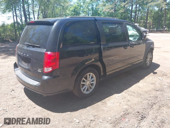 2014 Dodge Grand Caravan SXT with VIN 2C4RDGCG2ER313531, listed as a IAAI auction lot 42221726 with 177,065 mi miles and . Bid and sale history available at DreamBid. Image 4.