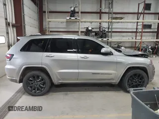 2018 Jeep Grand Cherokee Laredo E with VIN 1C4RJFAG6JC102969, listed as a IAAI auction lot 41963137 with 112,361 mi miles and . Bid and sale history available at DreamBid. Image 13.