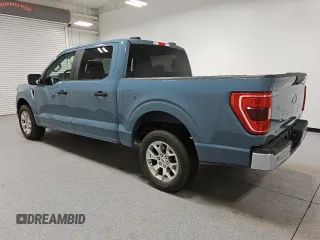 2023 Ford F-150 XL with VIN 1FTEW1C89PKE14033, listed as a Copart auction lot 58328605 with 53,902 mi miles and Clean title. Bid and sale history available at DreamBid. Image 2.