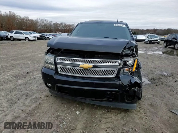 2014 Chevrolet Suburban LT with VIN 1GNSCJE01ER222961, listed as a Copart auction lot 84841744 with 168,131 mi miles and Salvage title. Bid and sale history available at DreamBid. Image 11.