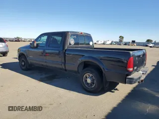 2003 Ford Super Duty F-250 XL with VIN 1FTNW20P23EB90968, listed as a Copart auction lot 41882395 with 215,373 mi miles and Salvage Title. Bid and sale history available at carsss.com. Image 2.