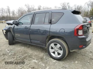 2014 Jeep Compass Latitude with VIN 1C4NJCEB5ED744997, listed as a Copart auction lot 87148424 with 124,408 mi miles and Salvage Title. Bid and sale history available at carsss.com. Image 2.