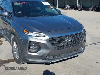 2019 Hyundai Santa Fe SE z VIN 5NMS23AD9KH037539, wystawiony jako IAAI lot #42221894 z przebiegiem 87 755 mil mil oraz . Historia ofert i sprzedaży dostępna na DreamBid. Obrazek 6.