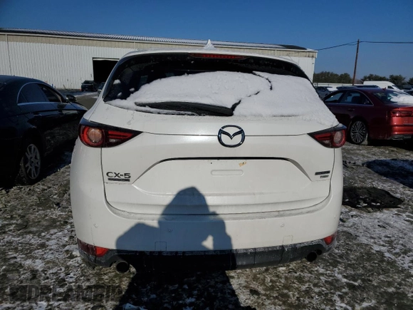 2021 Mazda CX-5 Signature with VIN JM3KFBEY5M0447759, listed as a Copart auction lot 42565535 with 24,175 mi miles and Salvage Title. Bid and sale history available at carsss.com. Image 6.