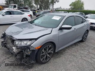 2018 Honda Civic Si with VIN 2HGFC1E50JH708274, listed as a IAAI auction lot 42034872 with 48,551 mi miles and . Bid and sale history available at DreamBid. Image 2.