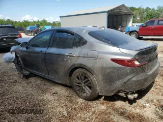 2025 Toyota Camry LE z VIN 4T1DAACK4SU588882, wystawiony jako Copart lot #52717395 z przebiegiem Nie podano mil oraz Szkoda całkowita • Salvage title. Historia ofert i sprzedaży dostępna na DreamBid. Obrazek 2.