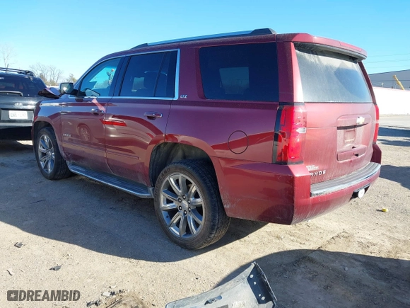 2016 Chevrolet Tahoe LTZ with VIN 1GNSKCKC9GR205745, listed as a IAAI auction lot 41710241 with 94,931 mi miles. Bid and sale history available at carsss.com. Image 3.