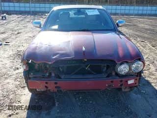2004 Jaguar XJ VDP with VIN SAJWA74C94SG21255, listed as a IAAI auction lot 41224294 with 141,978 mi miles. Bid and sale history available at carsss.com. Image 6.