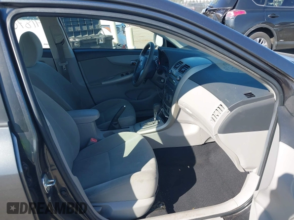 2011 Toyota Corolla L with VIN 2T1BU4EE1BC674644, listed as a IAAI auction lot 41876165 with 128,830 mi miles. Bid and sale history available at carsss.com. Image 5.