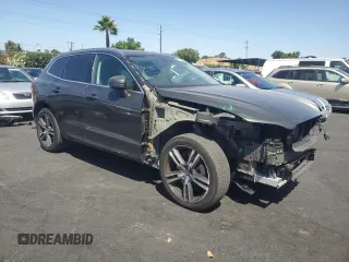 2018 Volvo XC60 Momentum with VIN LYVA22RK3JB117199, listed as a Copart auction lot 60888465 with 56,999 mi miles and Salvage title. Bid and sale history available at DreamBid. Image 4.
