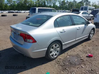 2009 Honda Civic LX z VIN 2HGFA165X9H540160, wystawiony jako IAAI lot #42389457 z przebiegiem 71 737 mil mil oraz . Historia ofert i sprzedaży dostępna na DreamBid. Obrazek 4.
