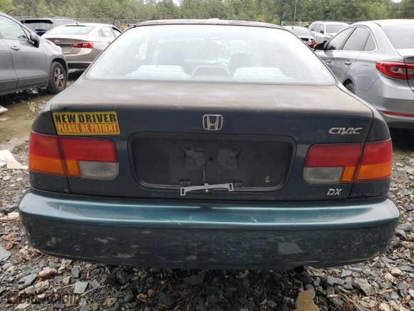 1997 Honda Civic DX with VIN 1HGEJ6223VL057580, listed as a Copart auction lot 74752434 with 239,657 mi miles and Salvage Title. Bid and sale history available at carsss.com. Image 6.